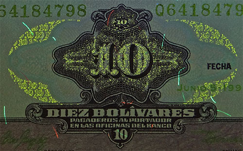 Piece bbcv10bs-eb04-q8 (Obverse, partial, under ultraviolet light)